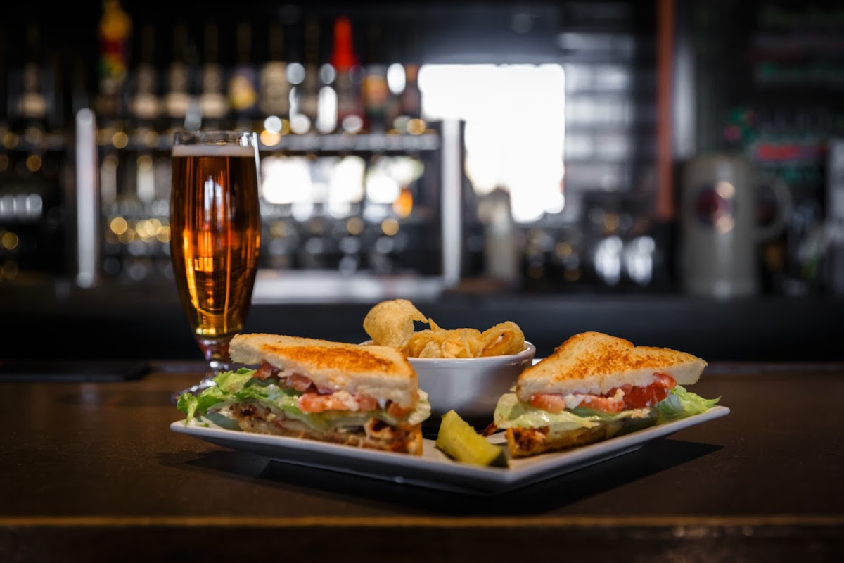 BLT sandwich, served with chips and beer